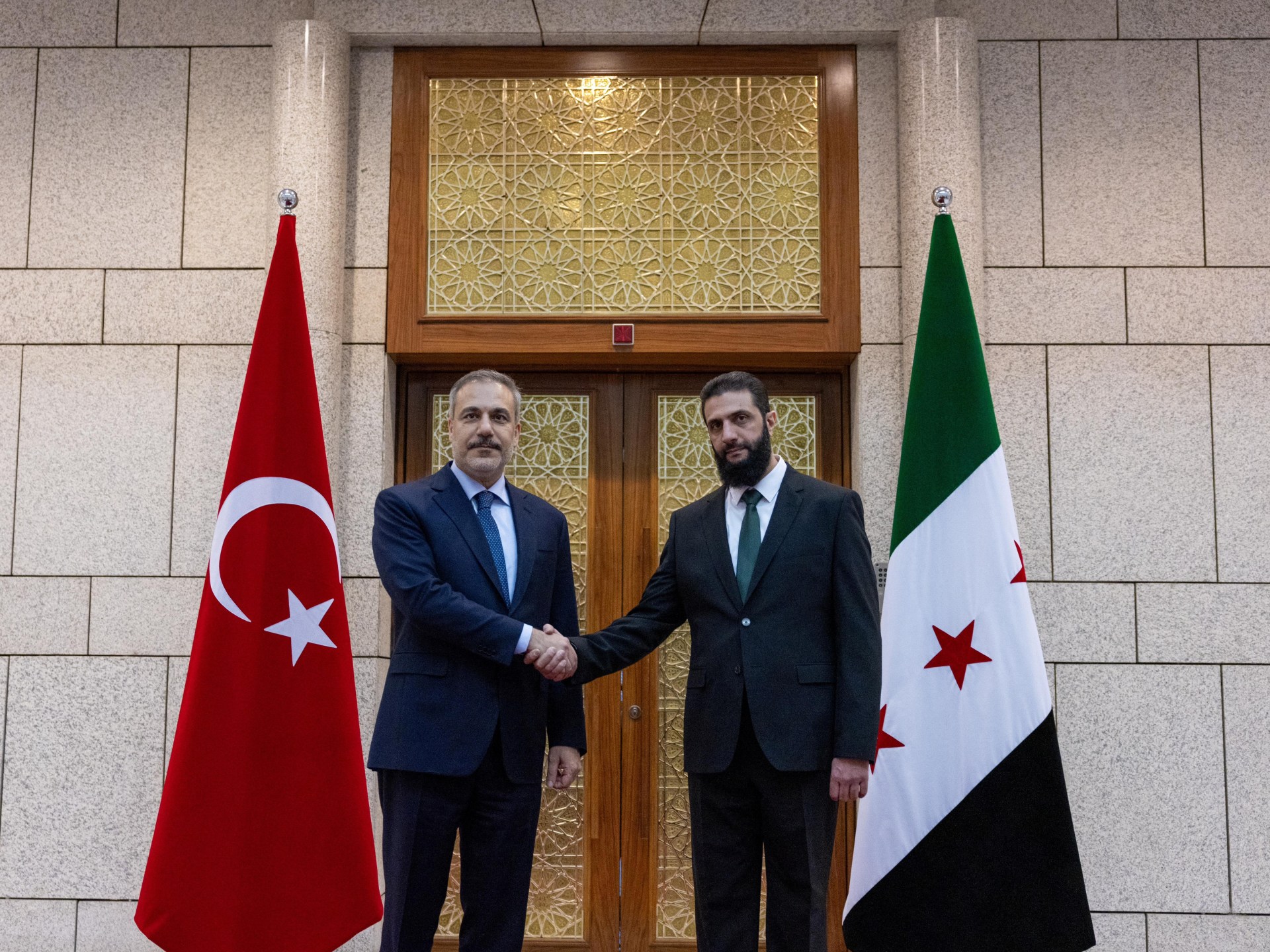 Turkiye FM meets Syria’s new leader, calls for lifting of global sanctions | Syria's War News