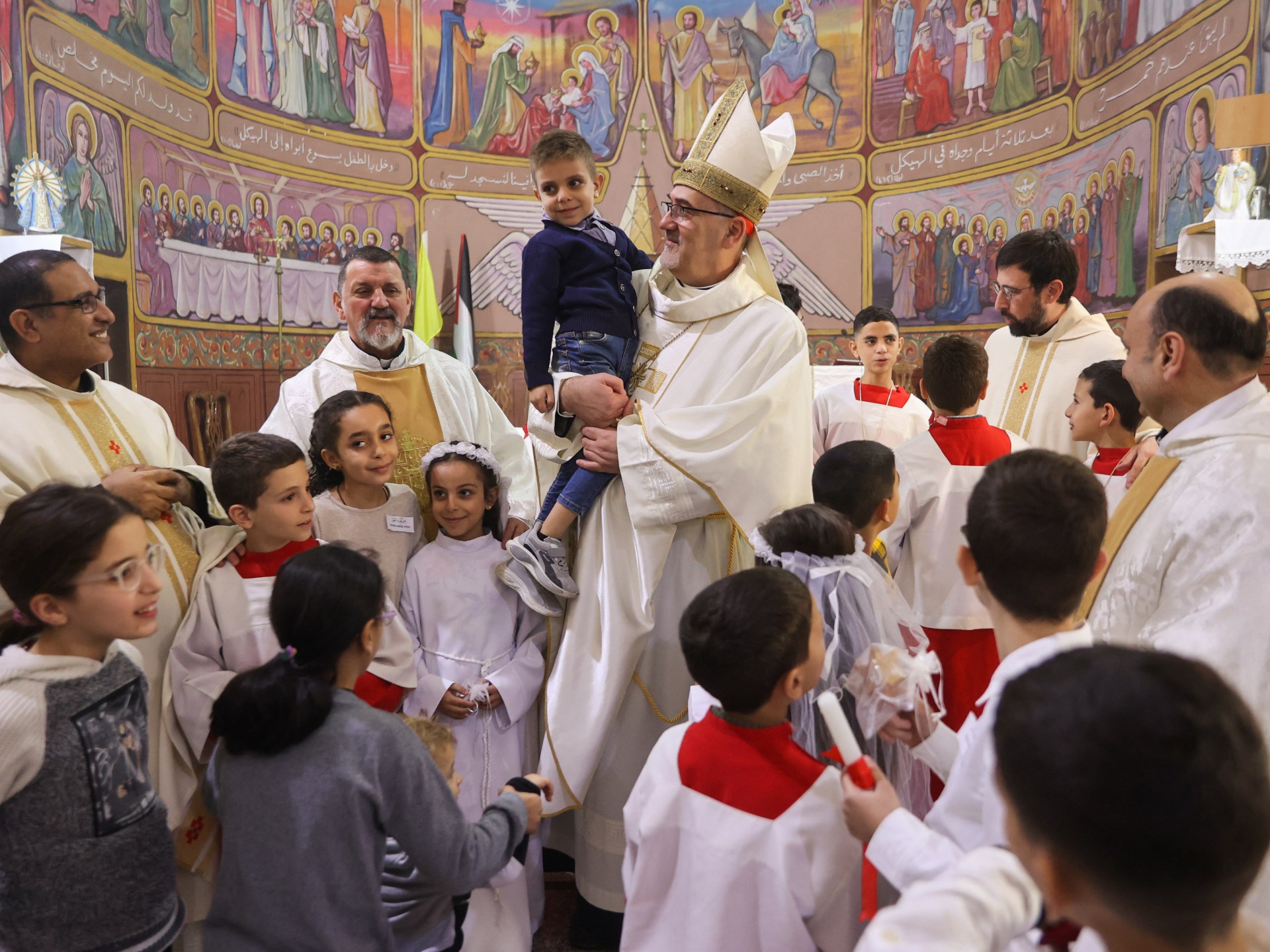 Church holds Christmas mass amid horrors of Israel’s war in Gaza | Israel-Palestine conflict News